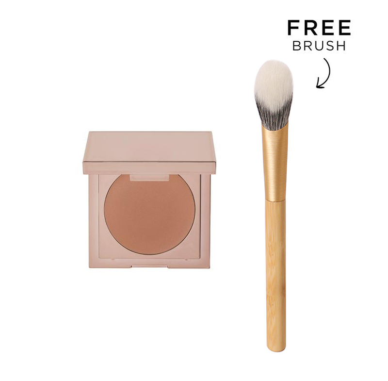 K-Beauty undereye corrector concealer in a rose gold compact with an applicator brush for dark circle correction.
