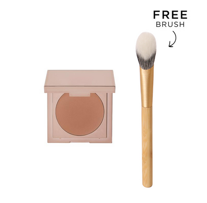 K-Beauty undereye corrector concealer in a rose gold compact with an applicator brush for dark circle correction.