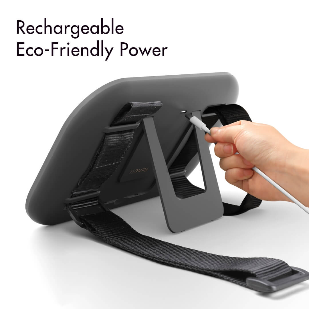 Rechargeable LED car visor mirror with built-in stand and USB charging cable for portable travel vanity use.