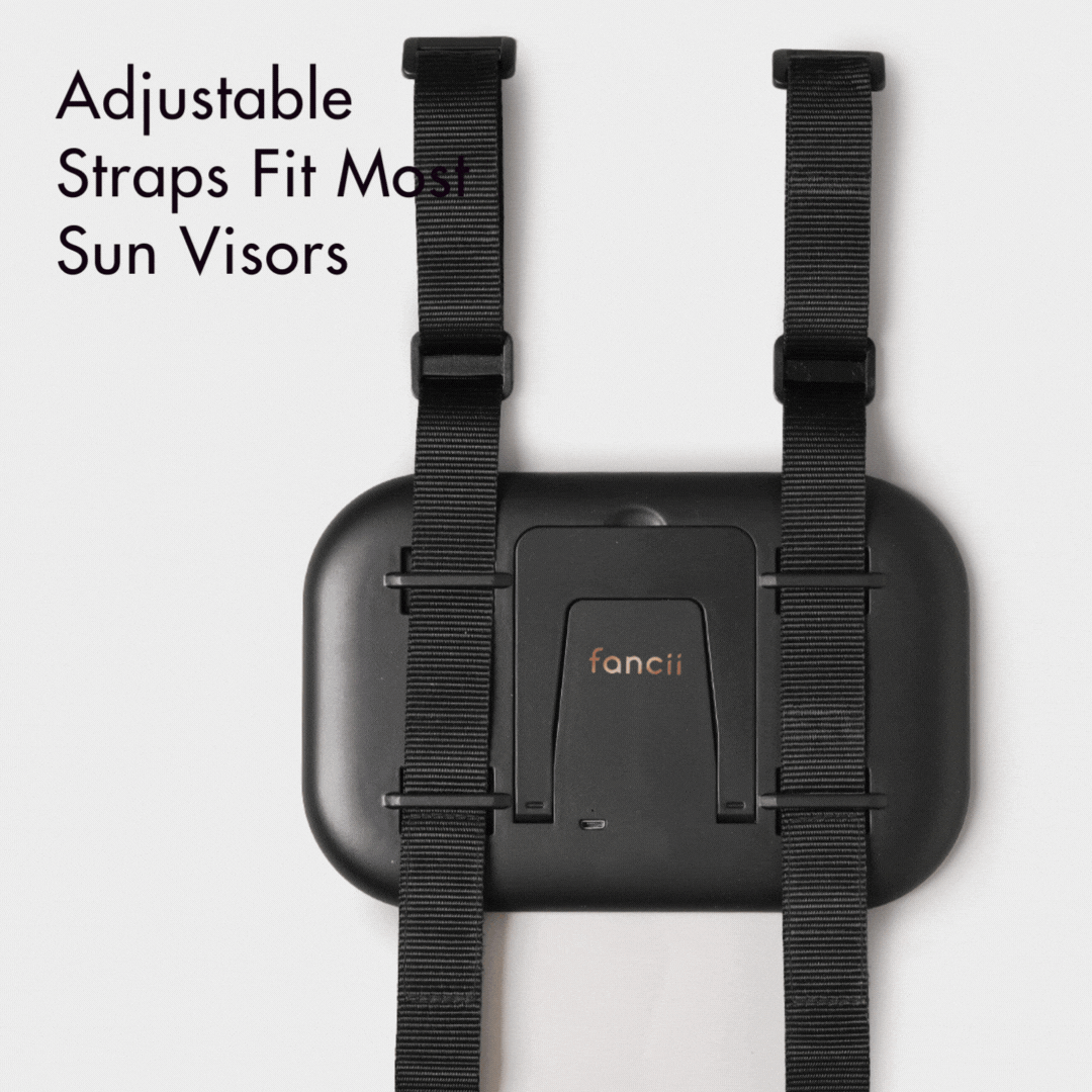 Juni 2 lighted car visor mirror back view showing adjustable mounting straps and built-in tabletop vanity stand.