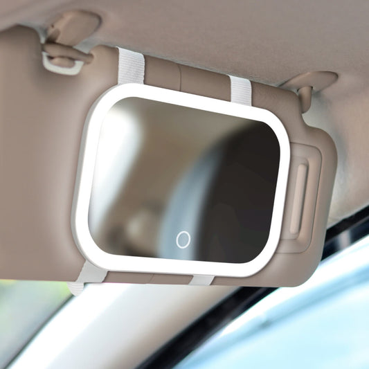 Juni 2 lighted car visor makeup mirror with LED ring light and touch sensor attached to a tan vehicle sun visor.