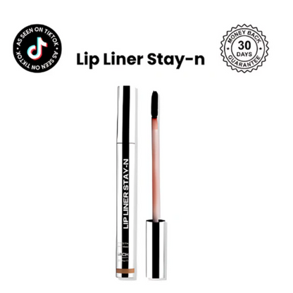 Lip Liner Stay-N peel-off lip tattoo in a sleek silver tube with applicator brush on a white background.