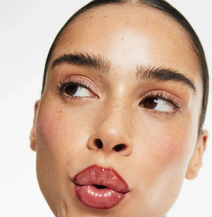 Close-up of a model wearing Stay-N Peel-Off Lip Liner in a long-lasting, bold matte plum shade.