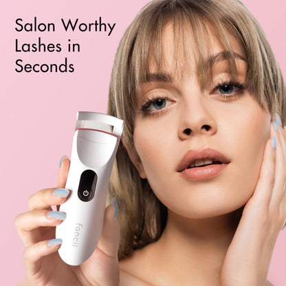Model holding the Tasha Heated Eyelash Curler by Fancii, showcasing lifted lashes and ergonomic electric design.